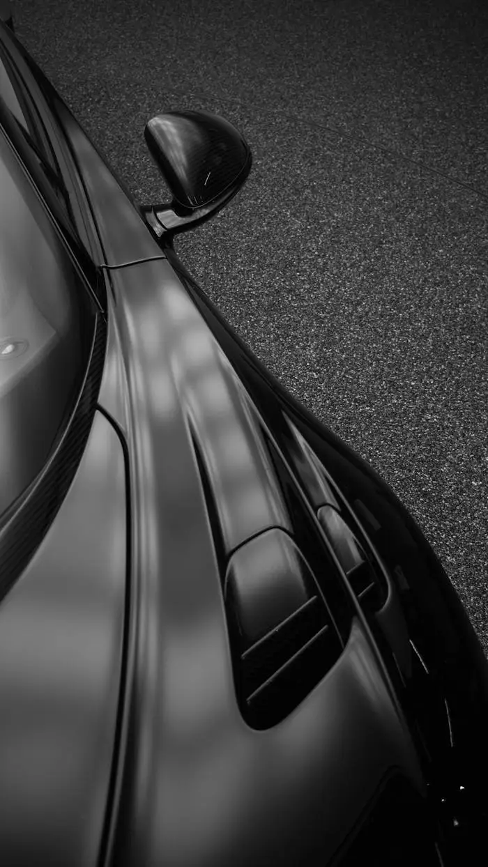 Black and white photo of a car's hood